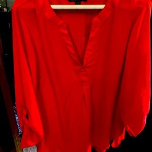 Dress shirt, shorter in the front and longer in the back